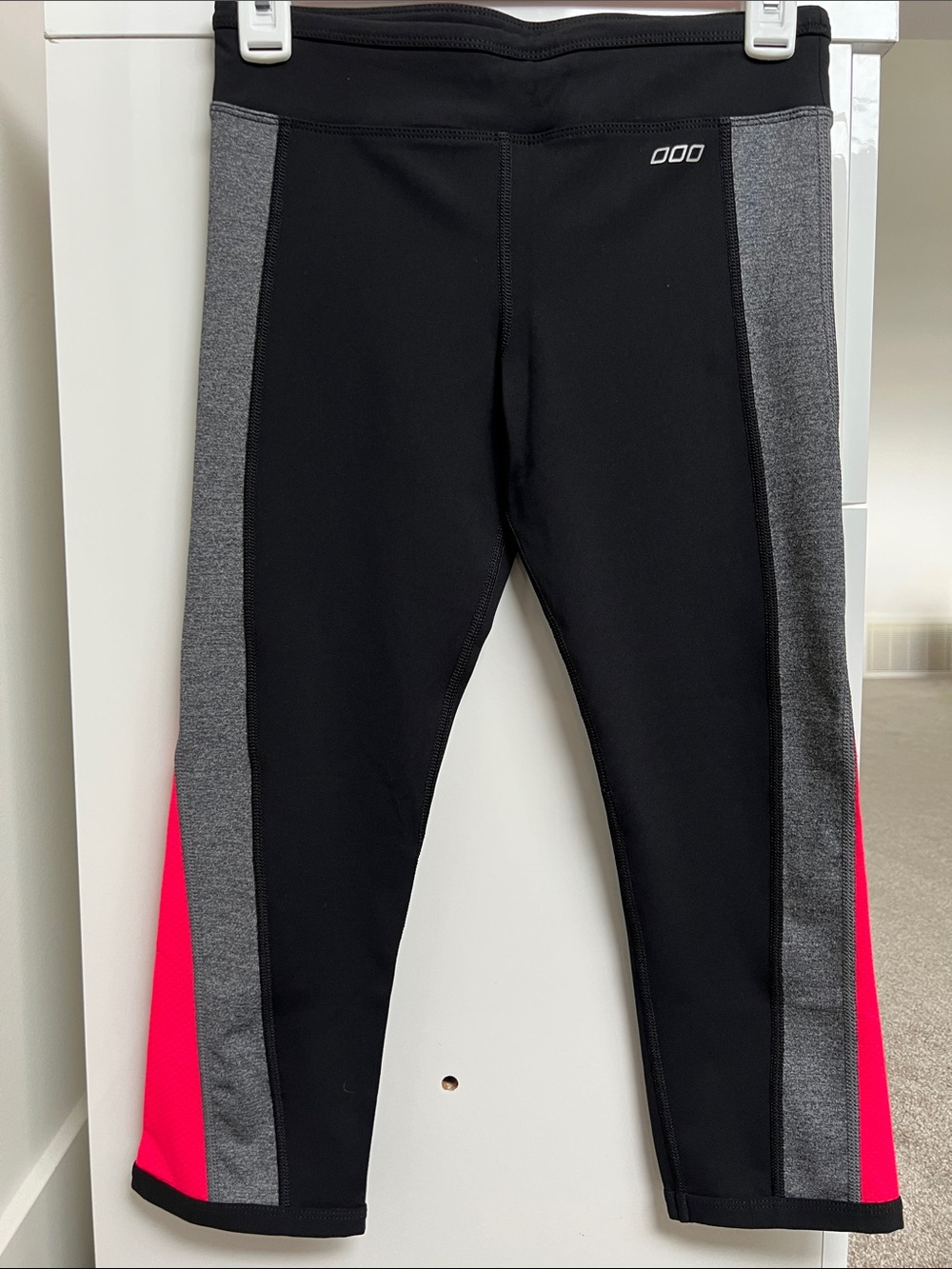 Lorna Jane Black capri Leggings with Gray Panels and Pink side vent